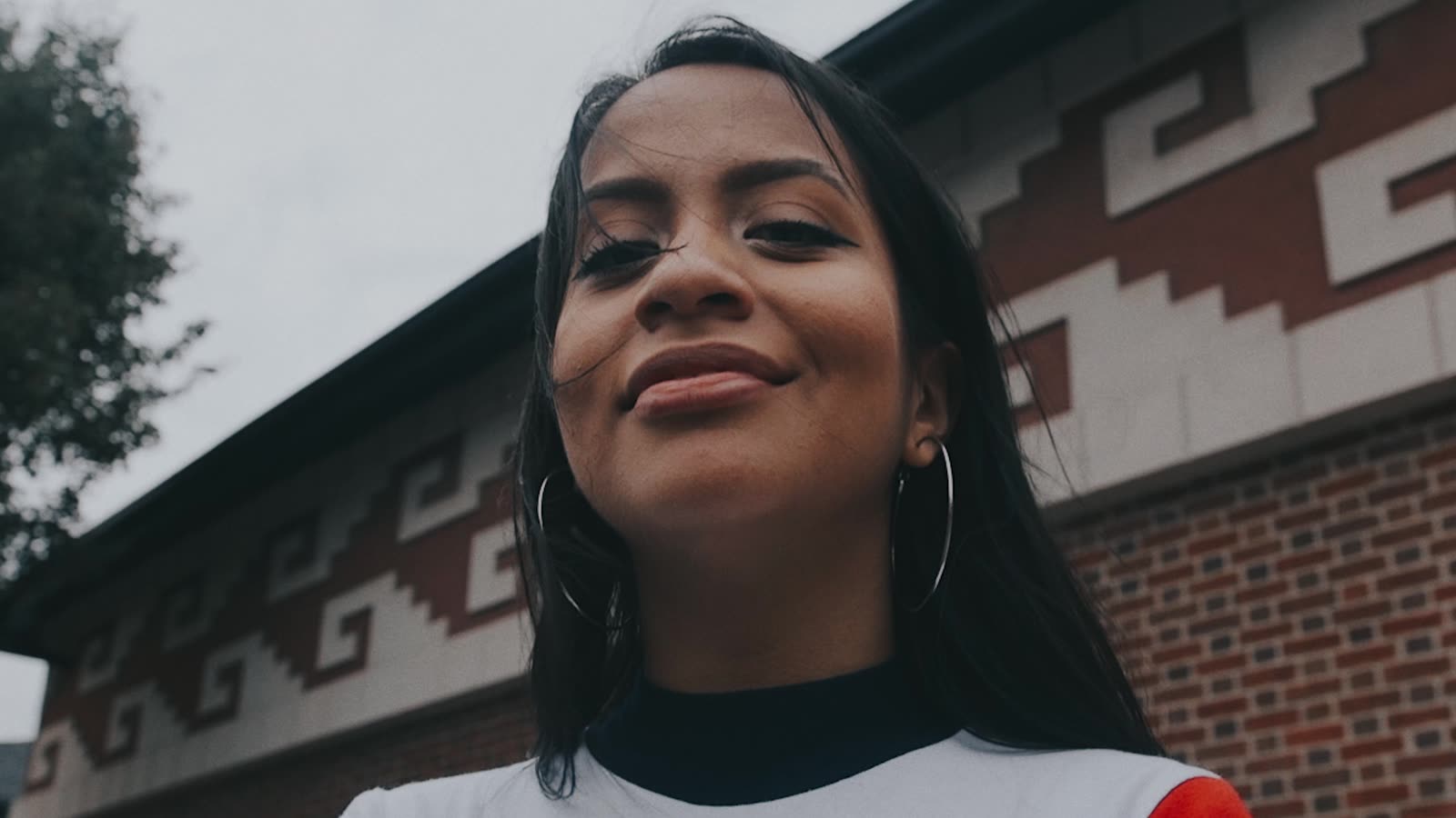 Smiling artist portrait, low angle