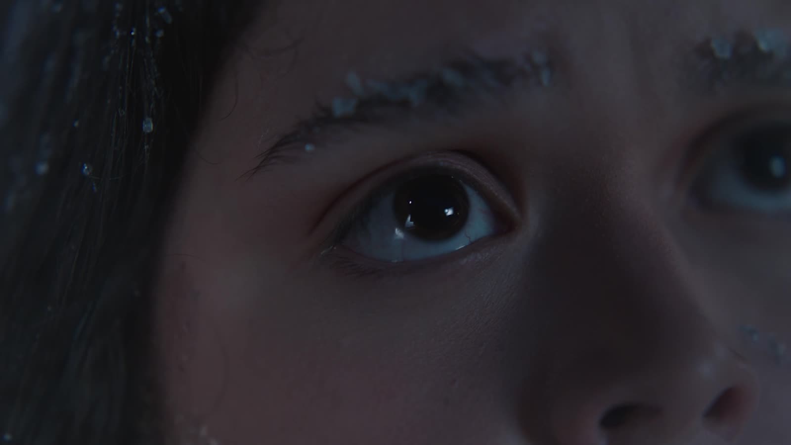 Frost spreading across a face